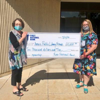 First National Bank, Ames, presents $10,000 check to Ames Public Library Friends Foundation