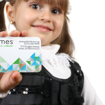 Child with Ames Public Library Card