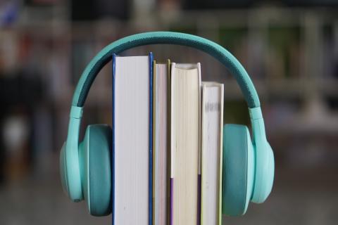 Photo of headphones on books